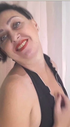 I move sexy in a black short dress. I look at you and smile. You see that I'm without panties. I touch my pussy, turn my ass to you and watch your reaction