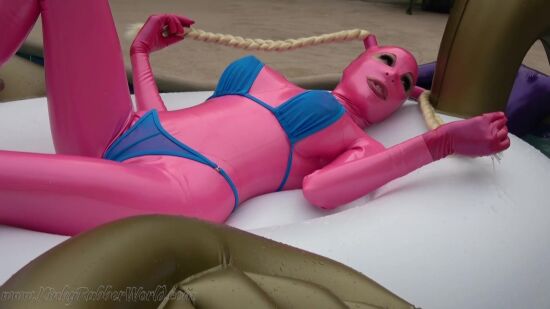 The Big Boob Rubberdoll Horny on the Pegasus Pool Float