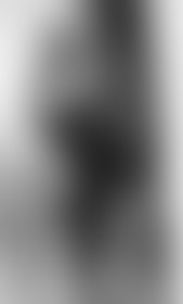 a woman in black tights taking a selfie in the mirror with her cell phone on the table next to her - post hidden image