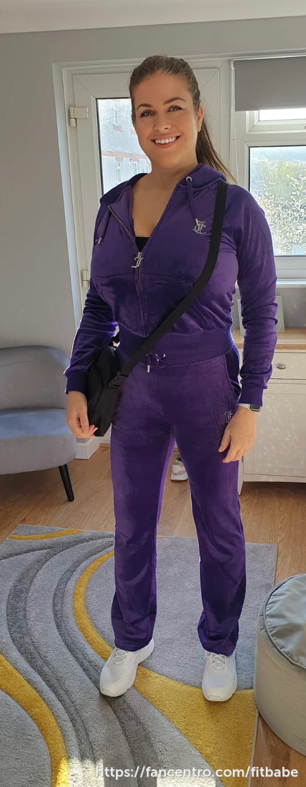 At home in my tight  purple tracksuit 1