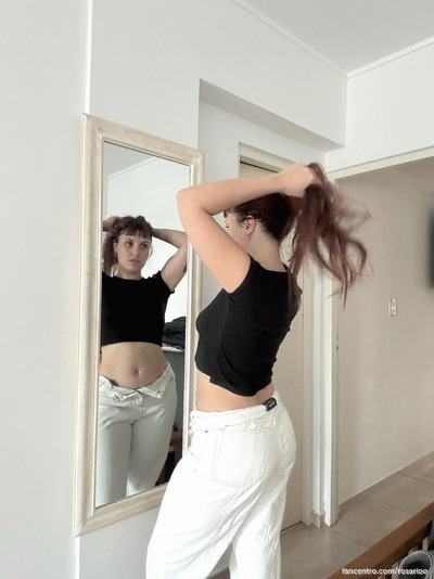 My red hair’s a fiery tease, wanna get closer? 🍑💋