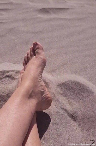 I'm enjoying my feet in the sand, and the sun on my skin!