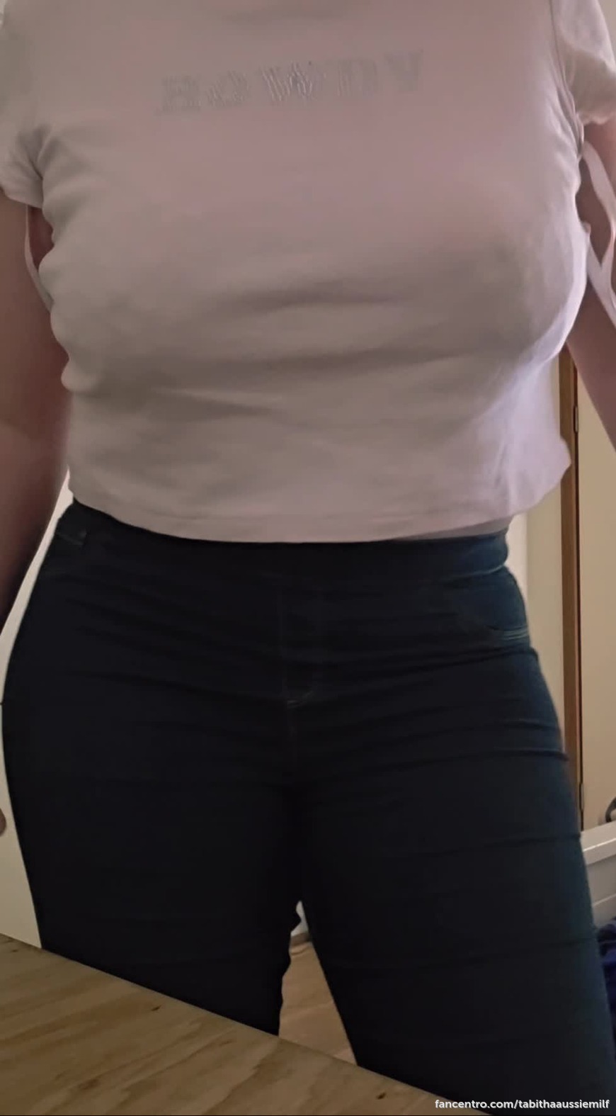 Taking my bra off after I've been at the shops. 1foreground