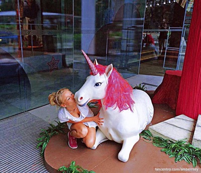 A unicorn next to a horse with a horn😅