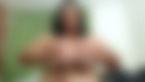 Fleshy topless woman streaming live