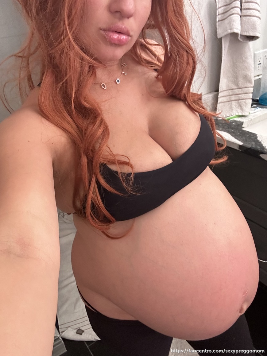 Big pregnant belly reveal out of dress 1